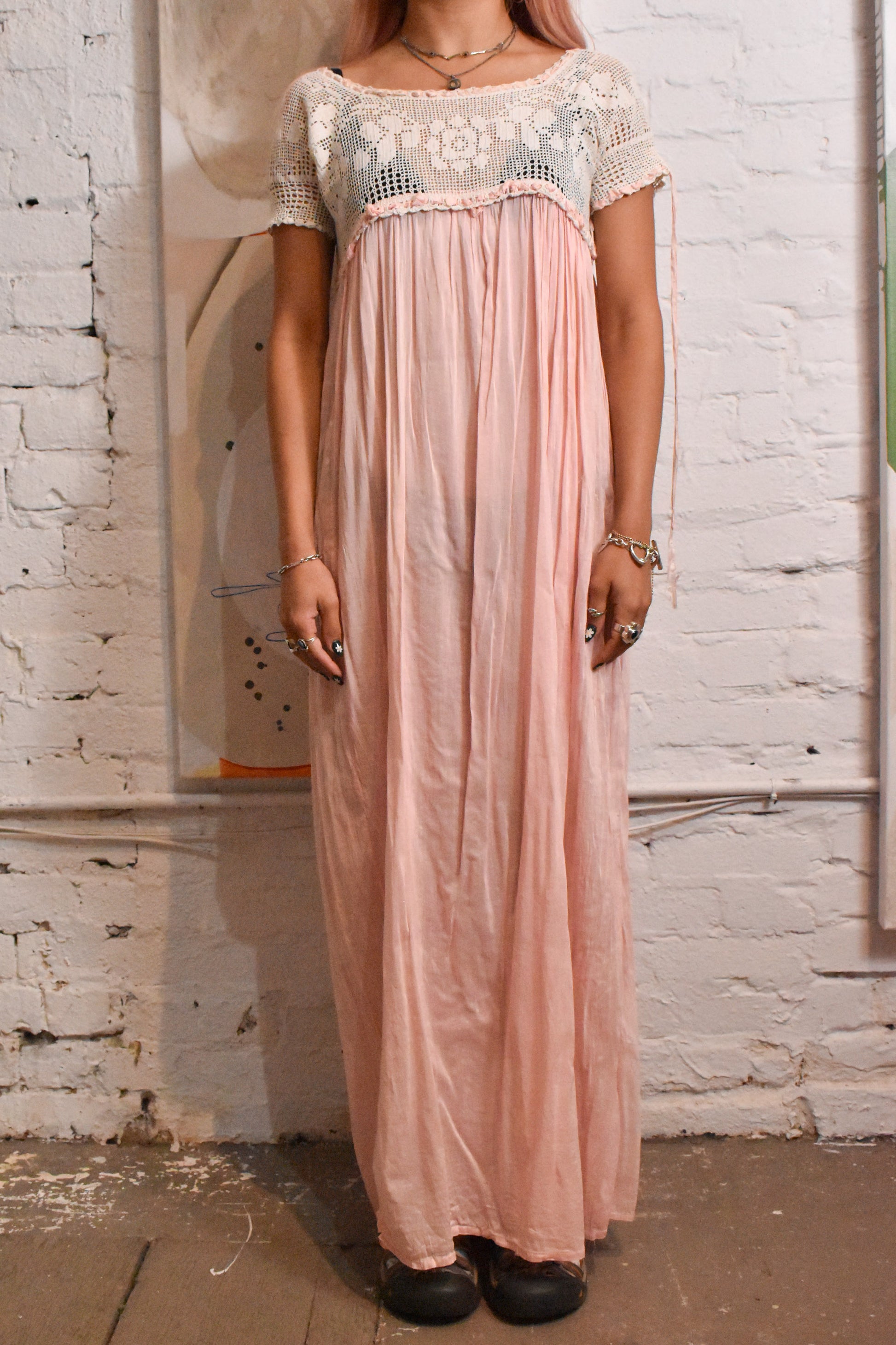 Delicate and timeless nightgown featuring intricate embroidery in soft baby pink. A beautiful piece for vintage sleepwear collectors and lovers of antique fashion.