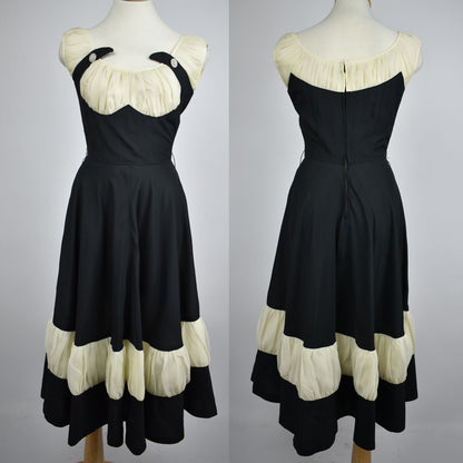 Vintage 1950s Black and White A-Line Dress with Underbust Corset Shape, Ruching Details, and Bedazzled Accent Buttons